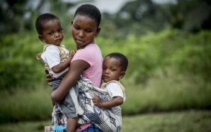 Young mother with children at Nyamebekyere clinic in Ghana. Source: Flickr